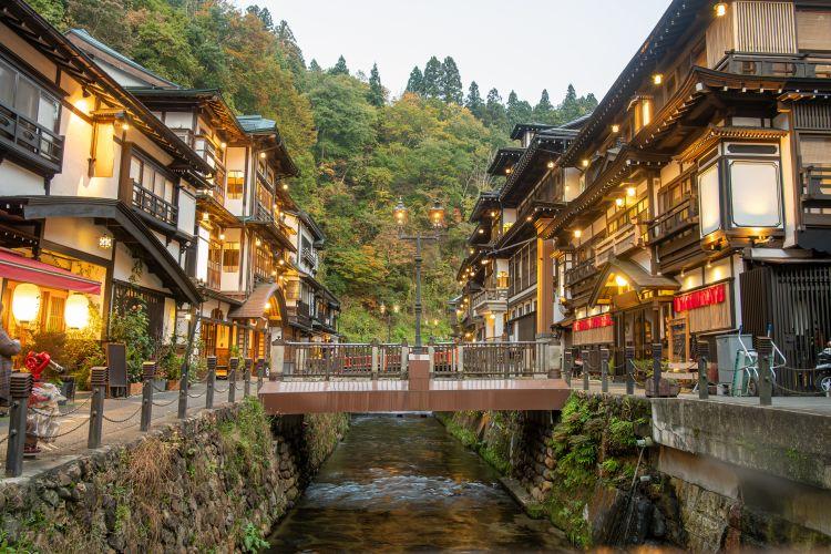 Traditional Japanese town surrounded by mountains and nature