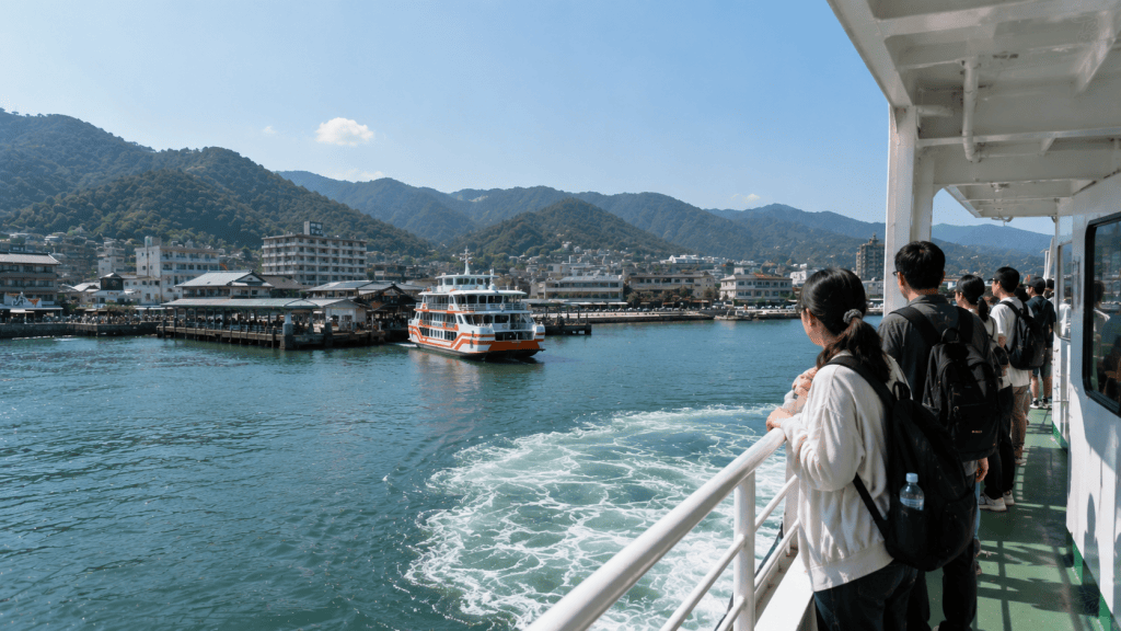 Travelers taking a ferry from Miyajimaguchi to Miyajima